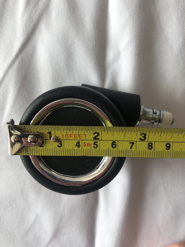 Precise diameter measurement of a computer chair caster wheel for client verification